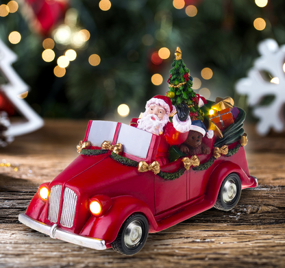 Santa in car with turning tree